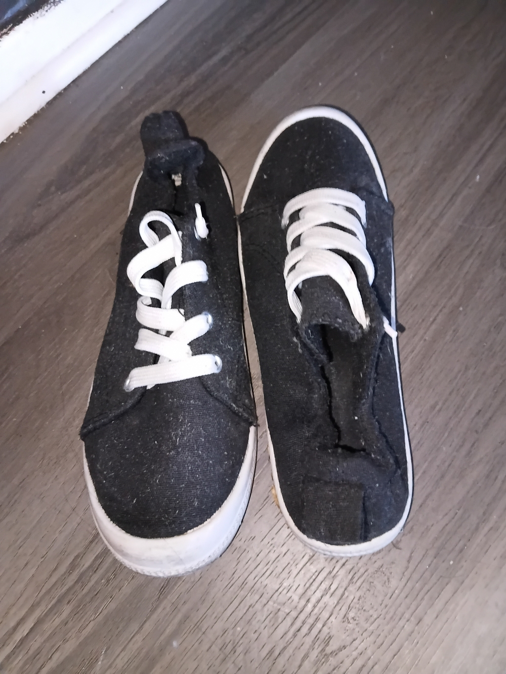 Womans Black Canvas Sneaker with White Laces
